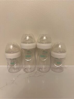NUK Clear Baby Bottles with White Caps - Set of 4